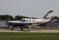 N418A @ KOSH - Socata TBM 700 - by Mark Pasqualino