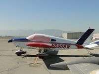 N8908W @ CNO - Covered, tied down and parked - by Helicopterfriend