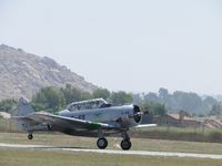 N7300C @ RIR - Touching down, tail wheel still up - by Helicopterfriend