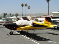 N641JD @ RIR - Covered up, tied down and parked in transient parking - by Helicopterfriend