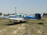 N9657Y @ RIR - Parked in the grass - by Helicopterfriend