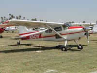 N2431Y @ RIR - Parked in the grass - by Helicopterfriend