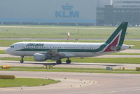 EI-DSJ @ EHAM - Alitalia - by Chris Hall