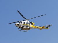 N14LA @ POC - LA County Fire Copter 14 arriving in between landings on runways 26R & 26L - by Helicopterfriend