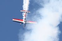 N260DC @ KOSH - Performing at Airventure 2011. - by Bob Simmermon