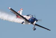 N260DC @ KOSH - Performing at Airventure 2011. - by Bob Simmermon