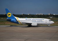 UR-GAT @ EDDT - B737-528 (WL) taxiing to stand at Berlin-Tegel. - by moxy