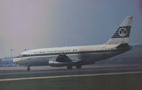 EI-ASA @ LHR - Boeing 737-248 named St. Jarlath of Aer Lingus Irish Airlines preparing for take-off on Runway 27L at Heathrow in November 1974. - by Peter Nicholson