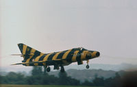 156 - French Air Force Super Mystere B.2 of EC.12 taking off at the 1977 International Air Tattoo at RAF Greenham Common. - by Peter Nicholson