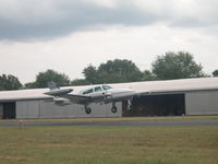 N310SK @ 3I3 - Landing rwy 26 after a charter flight.
picture isn't centered. photoshop can take care of that, but then it wont meet the criteria for upload.
