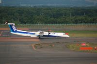 JA855A @ RJCC - DHC-8-Q402 ANA WINGS?TAKE OFF Rwy 19R - by A.Itoh