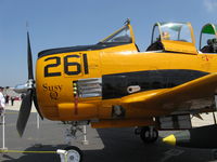 N7044L - 1955 North American T-28B TROJAN 'Susy Q', Wright R-1820-86 9 cylinder 1,425 Hp, in-service T-28s did not have the exhaust stacks mod and would burn off the fuselage paint over the wing - by Doug Robertson