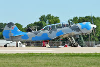 N343DC @ OSH - 2004 S C Aerostar S A YAK-52TW, c/n: 0412508
at 2011 Oshkosh - by Terry Fletcher