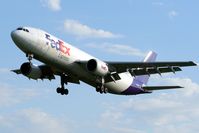 N683FE @ CYOW - Approaching rwy 25 in the early morning - by Dirk Fierens