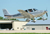 N664PH @ OSH - Cirrus Design Corp SR22T, c/n: 0099 at 2011 Oshkosh - by Terry Fletcher