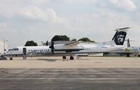 N430QX @ KRFD - DHC-8-400