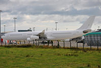 M-YRGQ @ EIDW - Parked on remotes before painting - by Robert Kearney