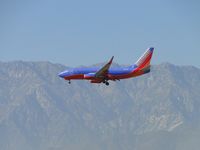 N783SW @ ONT - On final for runway 26R - by Helicopterfriend