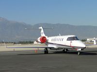 N100KK @ ONT - Covered up and parked on the southside - by Helicopterfriend