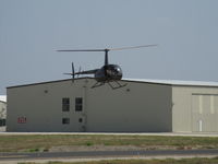 N590H @ CMA - 2008 Robinson R44 RAVEN II, Lycoming IO-540-AE1A5 245 Hp for 5 minutes, 205 Hp continuous, approach to landing - by Doug Robertson