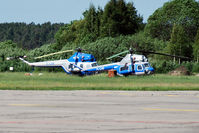 YL-LHH @ EVRA - Akoti's Mi-2 YL-LHC and YL-LHH have been stored at Riga airport for several years. - by Tomas Milosch