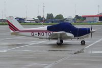 G-MOTO @ EGSH - Parked on a wet and windy morning. - by Graham Reeve