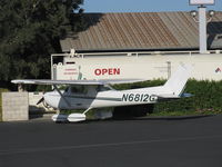 N6812G @ SZP - 1970 Cessna 150L, Continental O-200 100 Hp, refueling far from Florida home - by Doug Robertson
