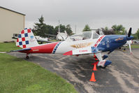 N260DC @ OSH - Chipmunk in sporty colours at 2011 Oshkosh - by Terry Fletcher
