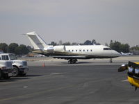 N831ET @ KSNA - Taxiing to 19R - by Nick Taylor Photography
