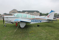 N6860W @ OSH - Aircraft in the camping areas at 2011 Oshkosh - by Terry Fletcher