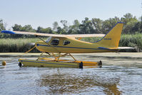 N302BM @ OSH - At Lake Winnebago, during 2011 Oshkosh Week - by Terry Fletcher
