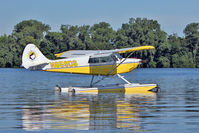 N859DS @ OSH - At Lake Winnebago, during 2011 Oshkosh Week - by Terry Fletcher