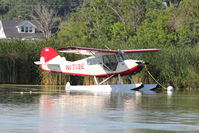 N1713E @ OSH - At Lake Winnebago, during 2011 Oshkosh Week - by Terry Fletcher