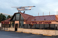 N8617G @ MKE - Atop restaurant opposite Milwaukee Airport - by Terry Fletcher