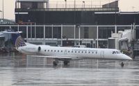 N12900 @ KORD - EMB-145LR - by Mark Pasqualino