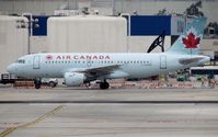 C-GARG @ KLAX - Air Canada A319 taxiing to Terminal 2