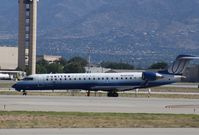 N728SK @ KABQ - CL-600-2C10