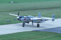 N9005R @ KDPA - Taxiing by the control tower after landing - by Glenn E. Chatfield