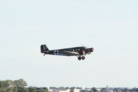 N352JU @ KDPA - Fly by on runway 28, seen from the control tower
