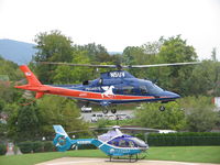 N5UV @ 8VA5 - UVA Hospital, N390PH in the background - by Ronald Barker