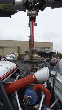 N202CH @ KOQN - Main rotor and hoses - by George A.Arana