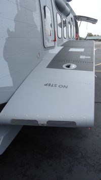 N146UK @ KOQN - Starboard sponson - by George A.Arana