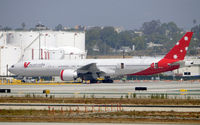 VH-VOZ @ KLAX - Waiting at LAX - by Todd Royer