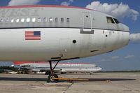 N220NW @ MEB - Framing a B.727 on the ramp at Laurinburg - by Duncan Kirk
