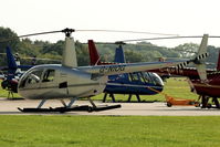 G-NIOG @ EGLD - 2004 Robinson Helicopter Co Inc ROBINSON R44 II, c/n: 10471 at Denham - by Terry Fletcher