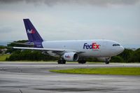 N428FE @ TJSJ - Taxing - by Jose L Marquez Colon