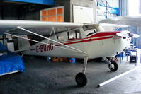 G-BUHO @ EGNH - inside the packed Blackpool Air Centre hangar - by Chris Hall