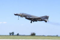 66-7690 @ KARR - Low speed pass over runway 27.  Unfortunate blur, but they are the only shots I have of this plane