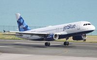 N568JB @ TNCM - Jet Blue departing TNCM runway 28