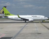 YL-BBX @ LFPG - In the mix of 737-500s and 300s in use for serving Riga to/from CDG, the series 300s predominate.